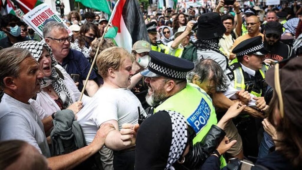 Mass Arrests as Palestine Action Defies Ban in Parliament Square While Anti-Migrant Protests Spark Tensions Across UK.