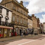 Shopkeeper Defends ‘Scumbags’ Sign After Police Call It Offensive.