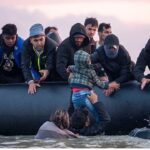French Police Watch as Migrants Board Small Boats While Labour’s ‘One In, One Out’ Scheme Faces Legal Challenges