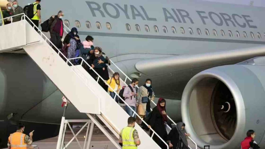 Evacuated Afghans Return for Holidays, Some Seek to Bring Second Wives to UK.