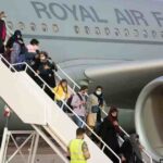 Evacuated Afghans Return for Holidays, Some Seek to Bring Second Wives to UK.